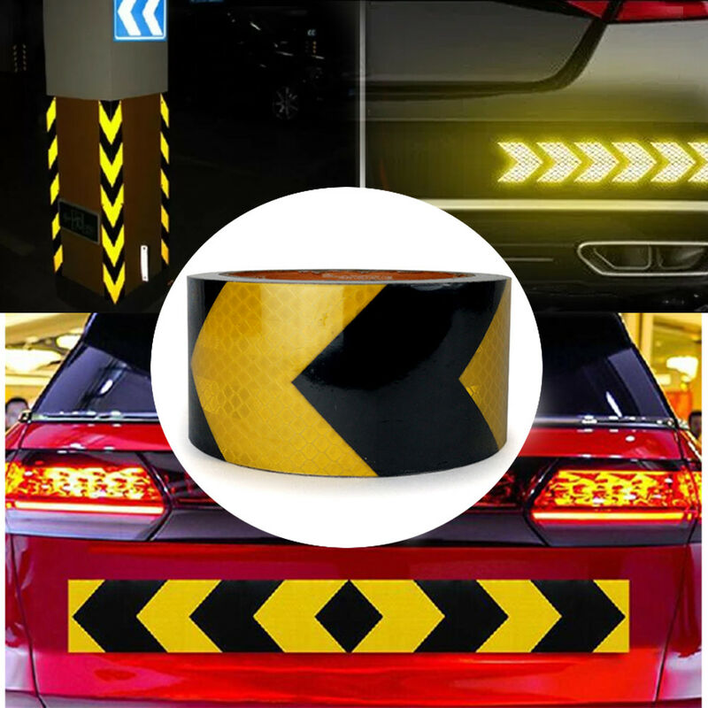 foto del prodotto nastro adesivo rifrangente giallo con frecce nere, per segnalazione parcheggi 50mm misura 50mm x 10 metri