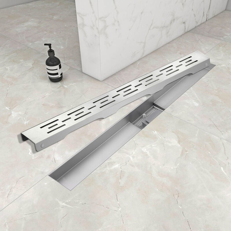 foto del prodotto ocean italy canalina di scarico doccia in acciaio inox con griglia a righe 130cm modello classico canaletta doccia con sifone antiodore e