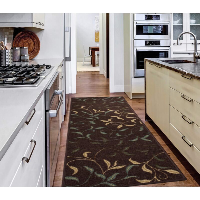 foto del prodotto ottomanson passatoia dal design contemporaneo con motivo foglie, collezione ottohome, fondo in gomma, 50 cm x 150 cm, colore marrone