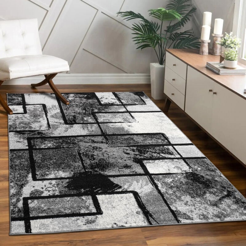 foto del prodotto paco home tappeto di design moderno pelo corto astratto effetto dipinto nero grigio antracite 160x230 cm