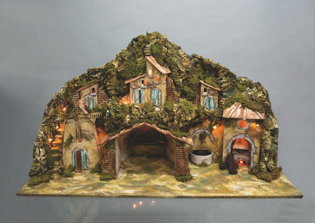 foto del prodotto paesaggio per presepe cm.42x96x58h con fontana,mulino,fuoco,10luci decorazione di natale
