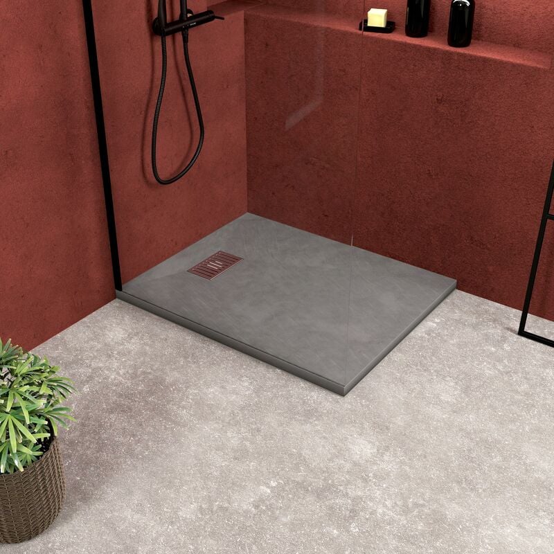 foto del prodotto piatto doccia grigio effetto pietra 70x90 cm e griglia motivo lineare in acciaio inox
