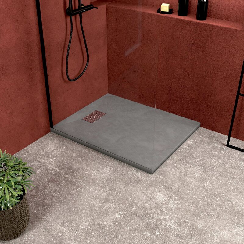 foto del prodotto piatto doccia grigio effetto pietra 70x90 cm e griglia motivo perforato in acciaio inox