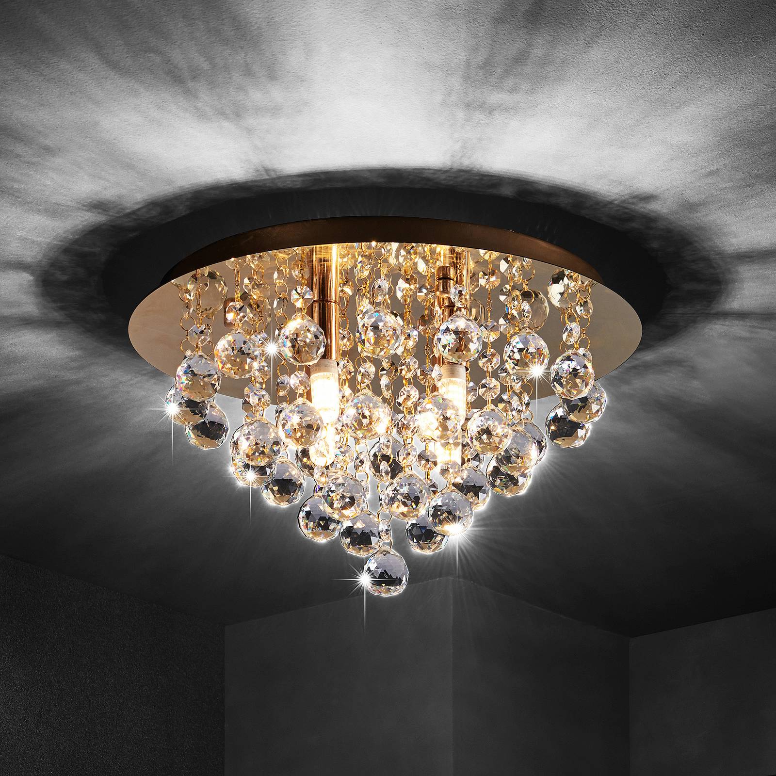 foto del prodotto plafoniera lindby gillion, a 4 luci, oro, cristallo, 35 cm