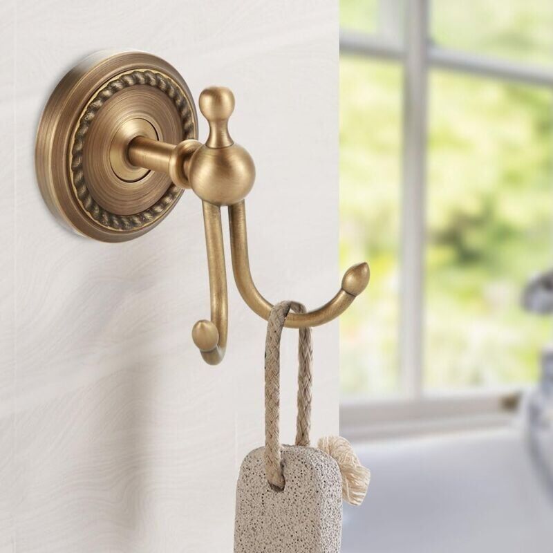 foto del prodotto portasciugamani da parete con base rotonda in ottone anticato, porta appendiabiti da parete per bagno, arredamento per la casa