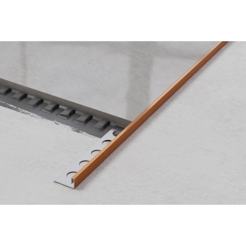 foto del prodotto profilo angolare js rettificato in acciaio inossidabile per piastrelle 1cm x 244cm rame satinato