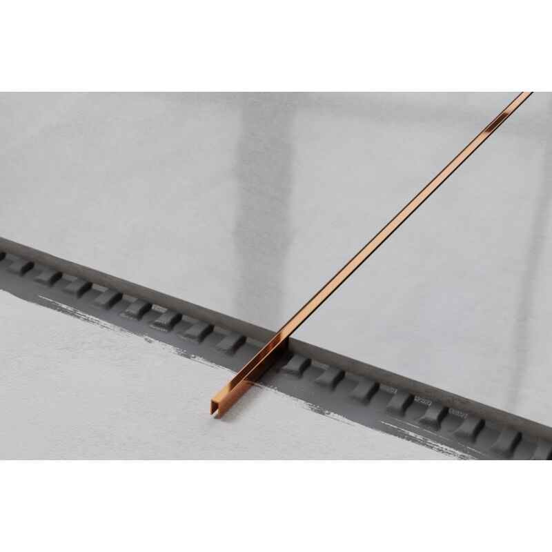 foto del prodotto profilo u di raccordo rettificato in acciaio inossidabile 0.5cm x 244cm - rame lucido