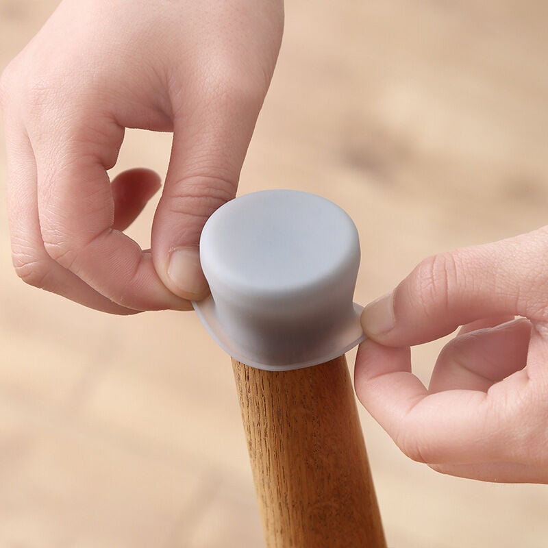 foto del prodotto protezioni per pavimento in silicone per gambe di sedie, senza feltrini, antiscivolo, 4 pezzi. proteggi i tuoi pavimenti dai graffi e riduci il