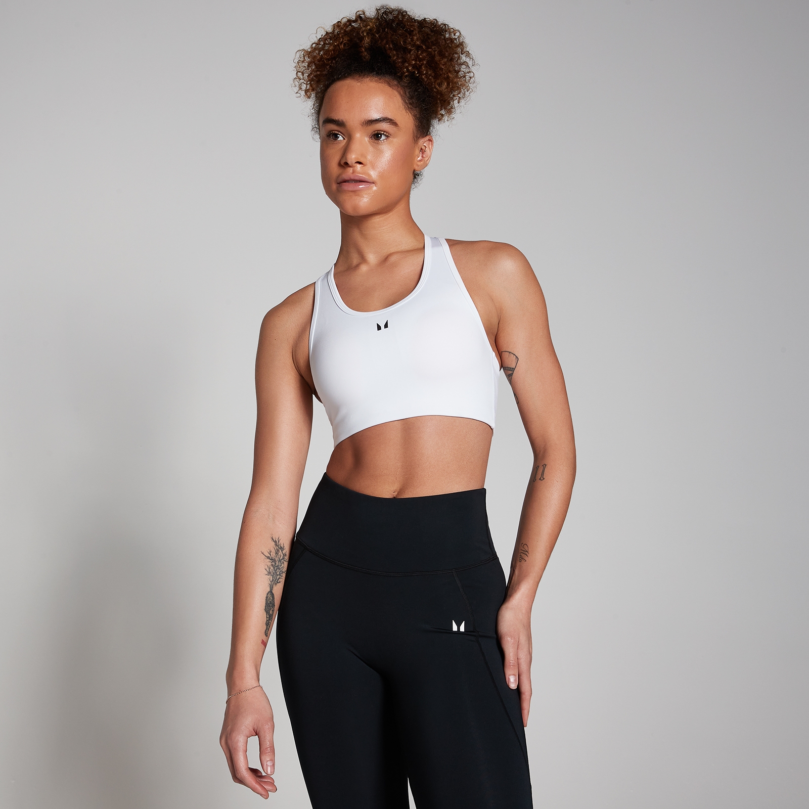 foto del prodotto reggiseno sportivo con design a vogatore mp bianco xxs