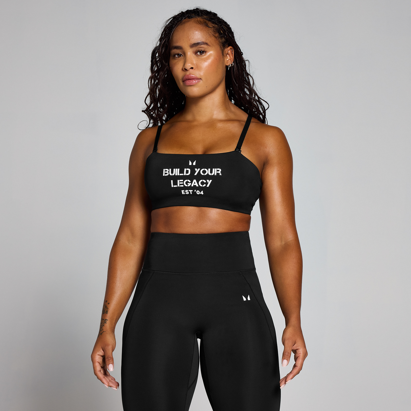 foto del prodotto reggiseno sportivo con grafica origin mp nero m