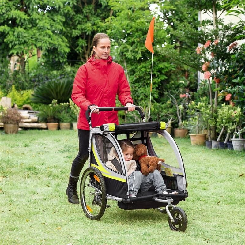 foto del prodotto rimorchio bici e passeggino per 2 bambini con cinture di sicurezza e bandierina