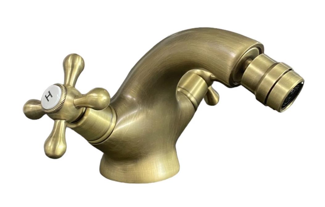 foto del prodotto rubinetto bagno bidet con snodo vintage, maniglie a stella bronzato