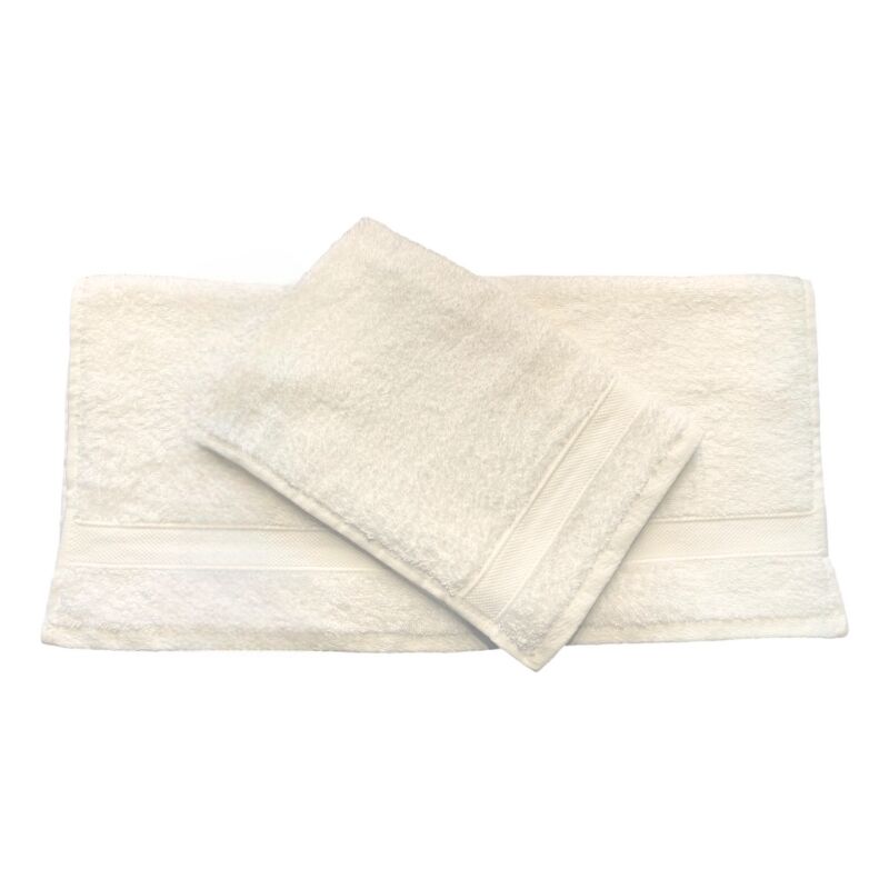 foto del prodotto set 2 asciugamani bagno viso e bidet in 100 spugna di puro cotone in tinta unita dal color latte gloupie