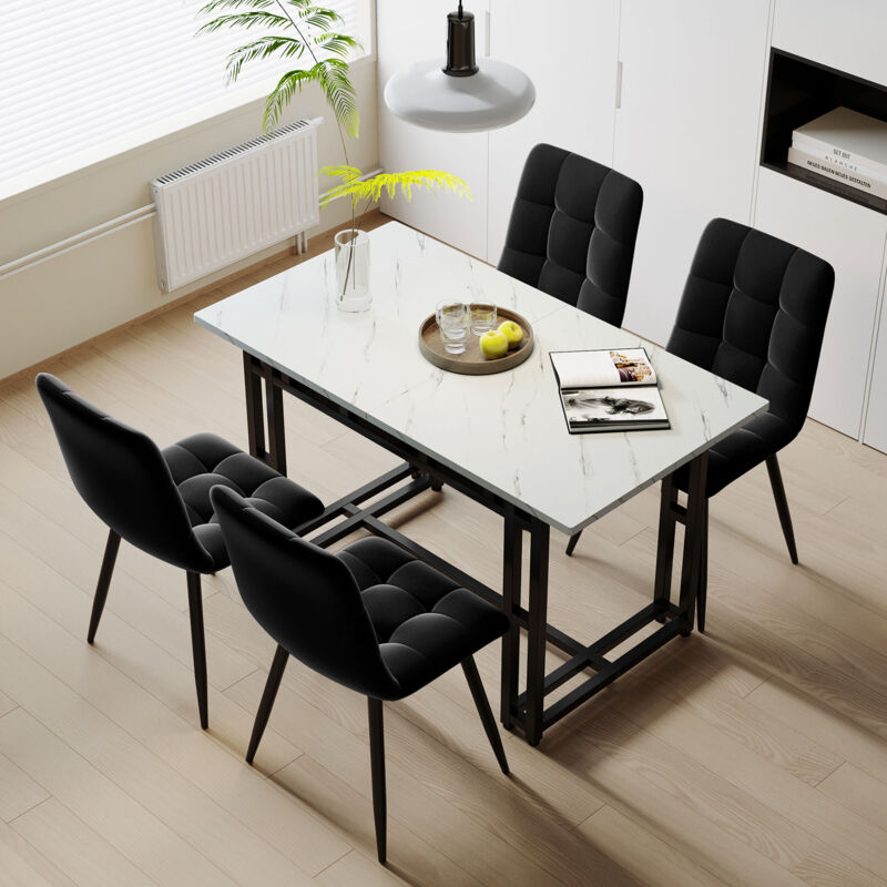 foto del prodotto set da pranzo bianco 120 x 70 cm con 4 sedie in velluto nero. tavolo con gambe in ferro nero