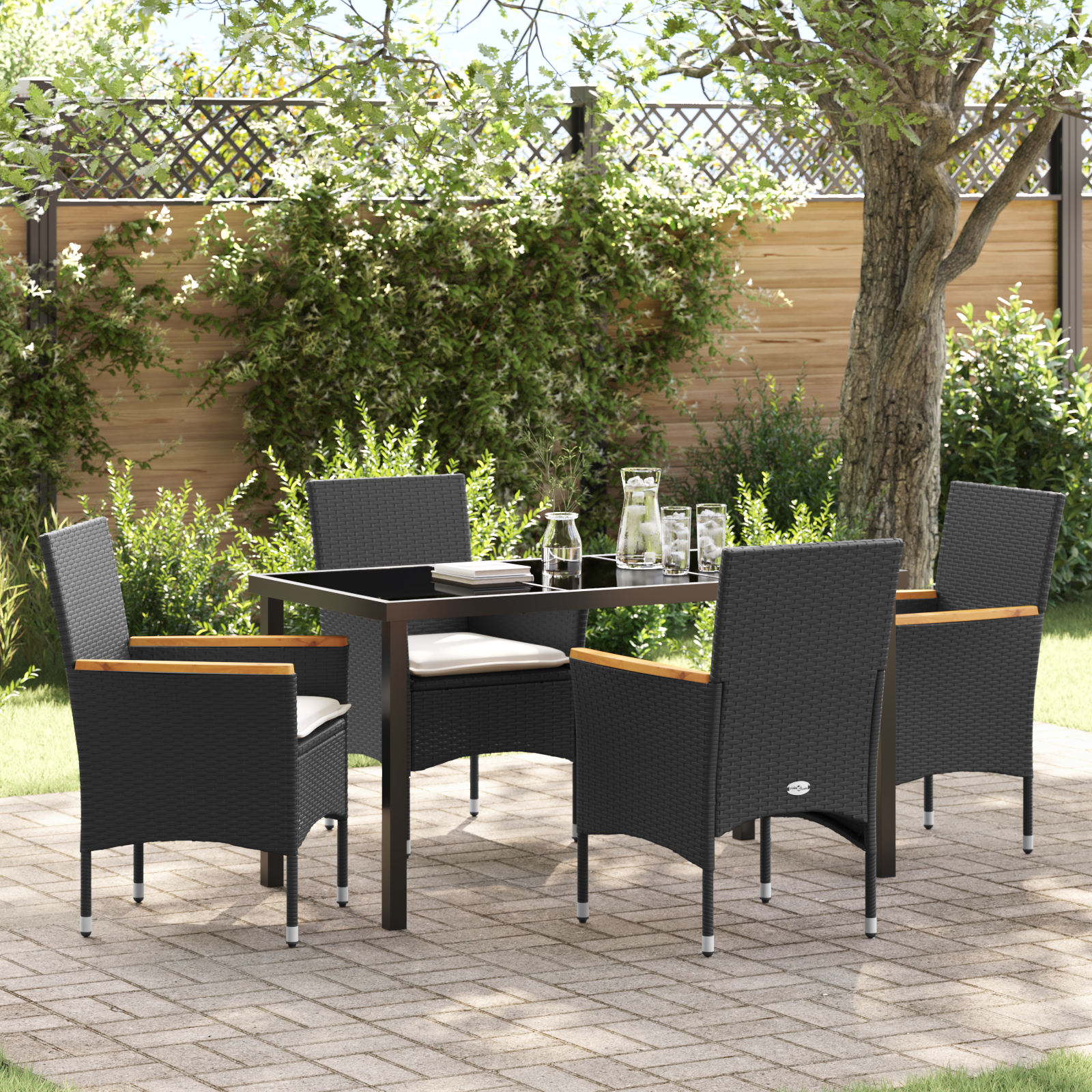 foto del prodotto set da pranzo da giardino di 5 pezzi con cuscini in rattan nero