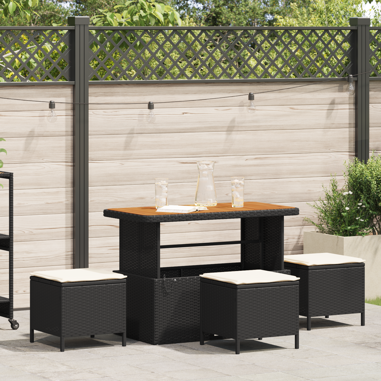 foto del prodotto set da pranzo da giardino in 4 pezzi con cuscini rattan polirizzato nero acacia