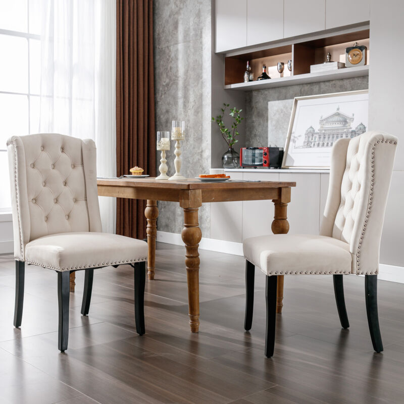 foto del prodotto set di 2 sedie da pranzo in velluto con gambe in rovere, bottone, battente cromato e rifiniture con testa di chiodo, beige