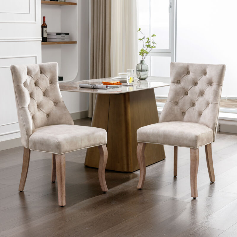 foto del prodotto set di 2 sedie da pranzo in velluto, con schienale alto. con trapuntatura a bottoni. struttura in legno, beige chiaro