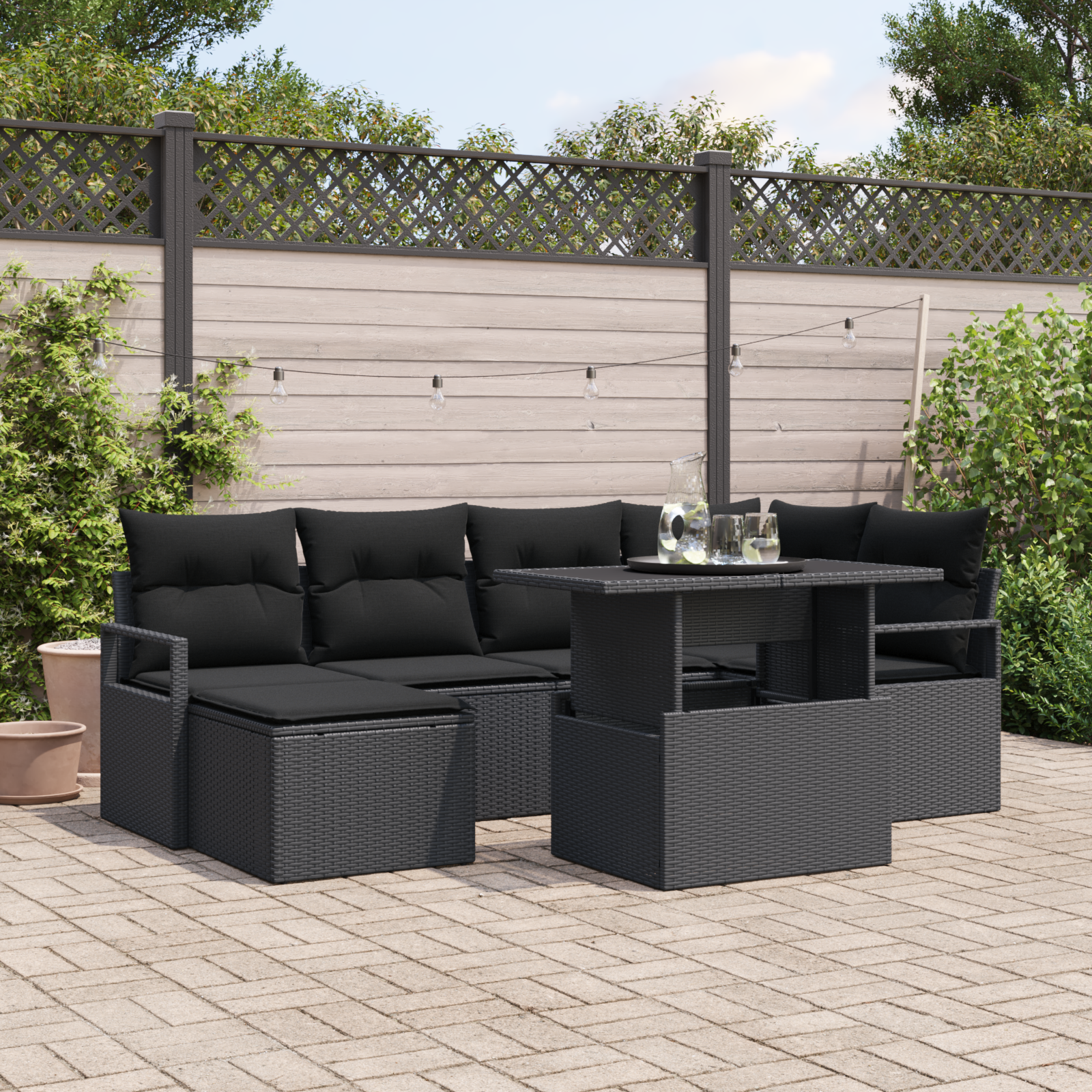 foto del prodotto set divani giardino 7 pezzi con cuscini nero polyrattan