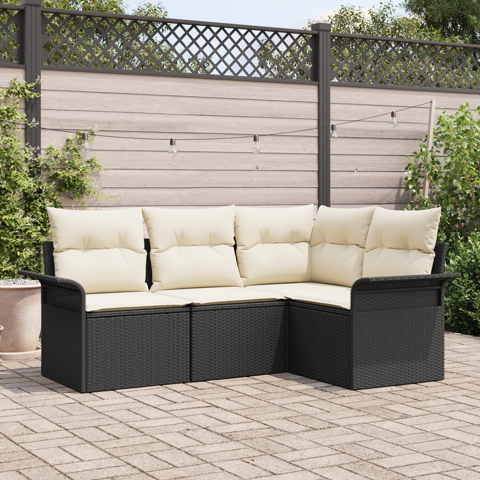 foto del prodotto set divano da giardino 4 pezzi con cuscini polyrattan nero