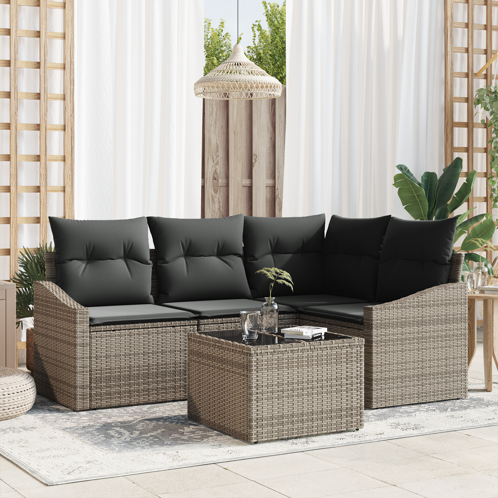 foto del prodotto set divano da giardino a 4 pezzi con cuscini nero polyrattan