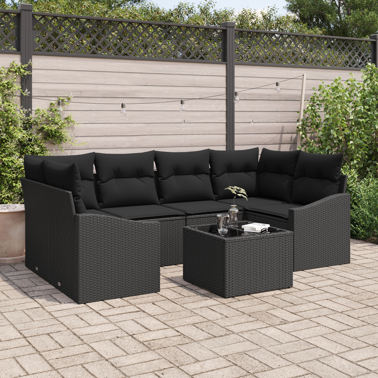 foto del prodotto set divano da giardino in 7 pezzi con cuscini polyrattan nero