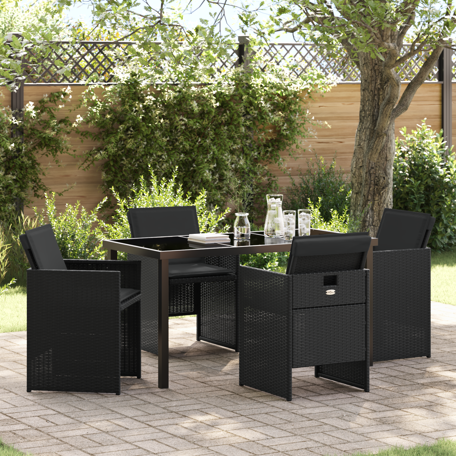 foto del prodotto set pranzo giardino 5 pezzi con cuscini nero polyrattan
