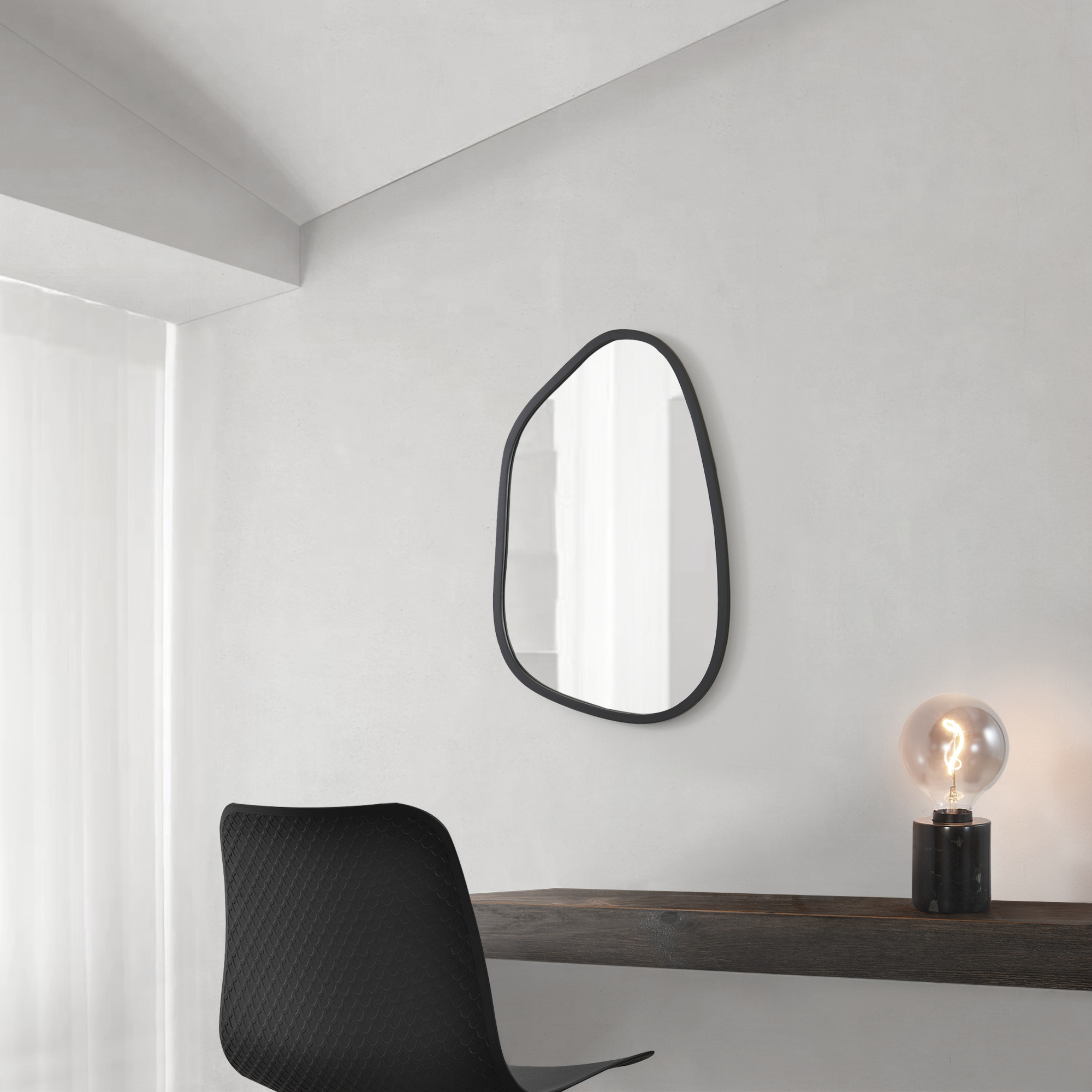 foto del prodotto specchio da parete filiano 80 x 58 cm cornice irregolare nero en.casa 