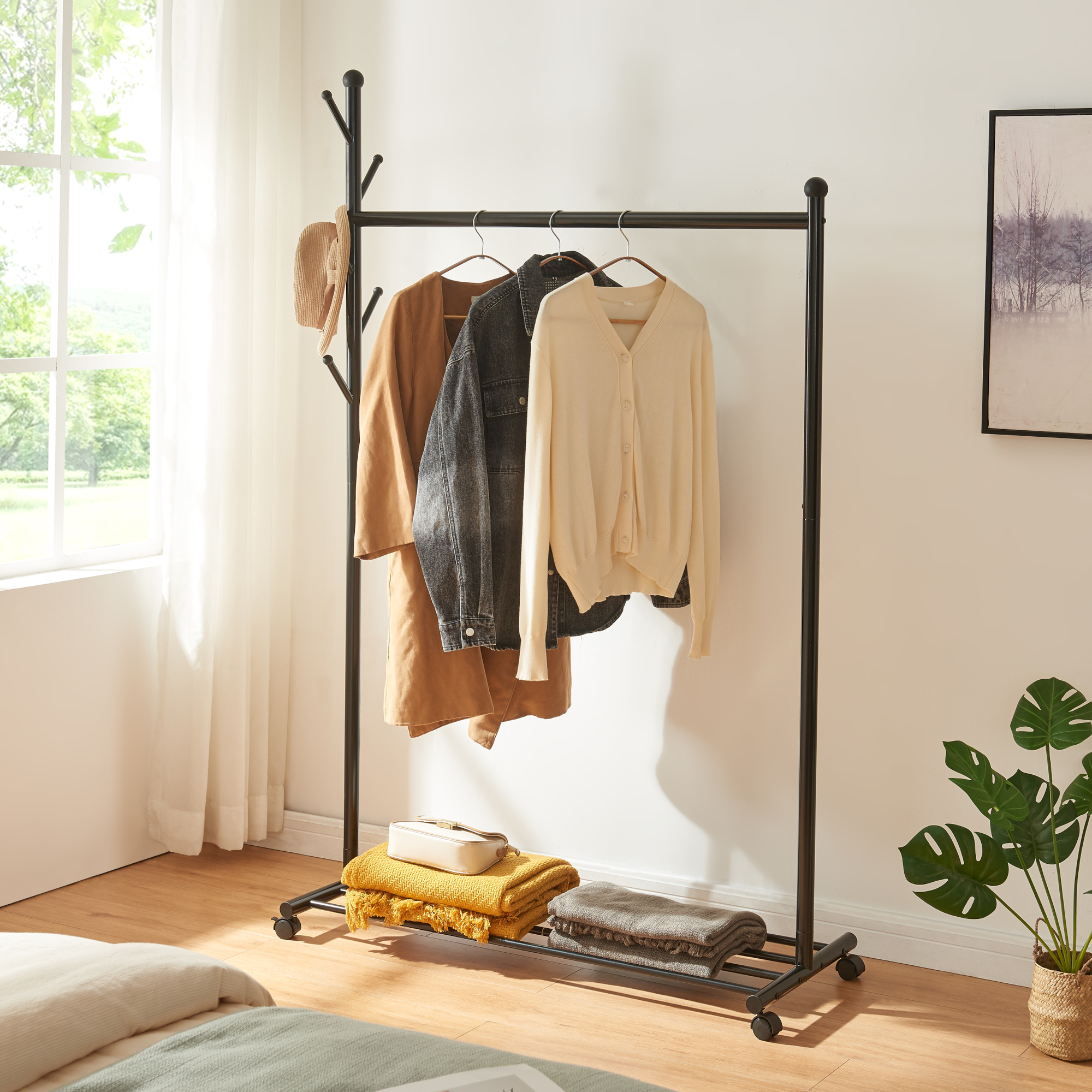 foto del prodotto stand appendiabiti sn sa con rotelle 170x105x43 cm metallo nero en.casa 