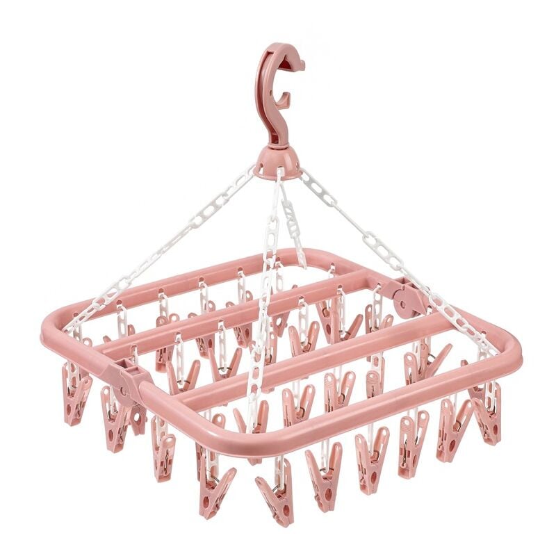foto del prodotto stendibiancheria con 32 clip e supporto raccogli gocce pieghevole rosa sollbry