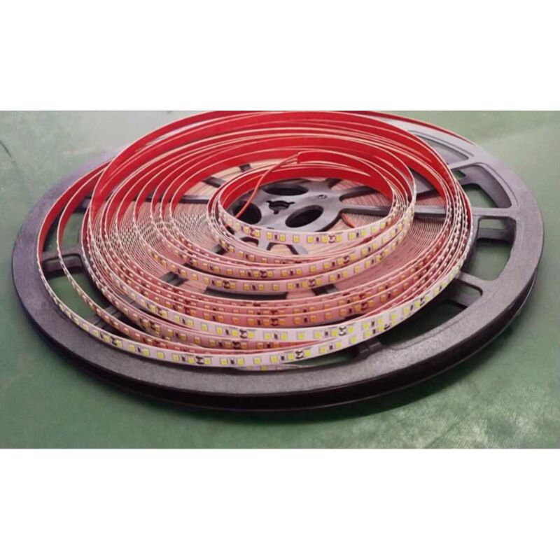 foto del prodotto stricia strip led 24v 12w 2835 ip20 alta luminosità biadesiva bobina 50mt 120 led/mt 10 metri - 3000k calda