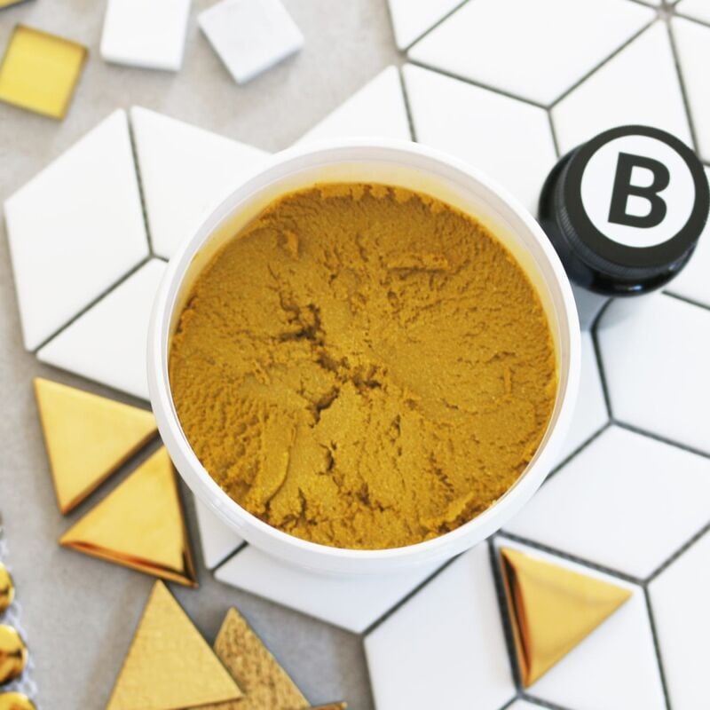 foto del prodotto stucco epossidico bicomponente per riempimento fughe oro metallizzato 3kg