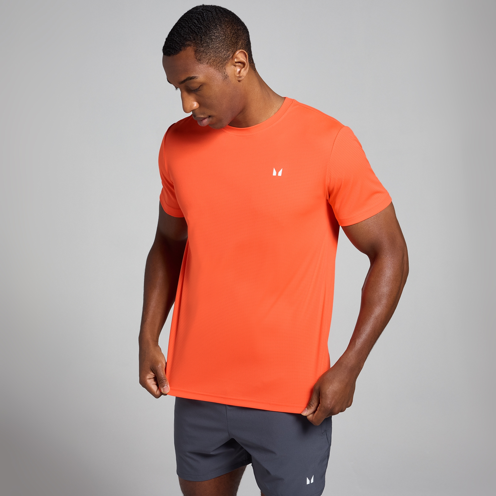foto del prodotto t shirt sportiva con trama a griglia mp active da uomo arancione xs