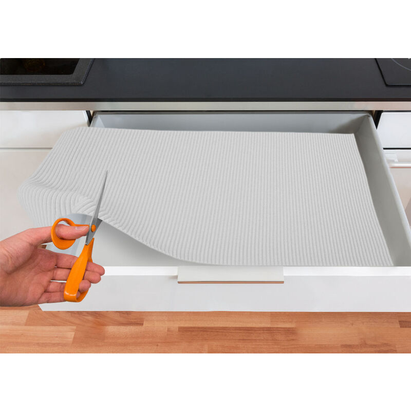 foto del prodotto tappetino gommato antiscivolo multiuso per cassetti e superfici colore bianco, misura65x200cmcolorebianco