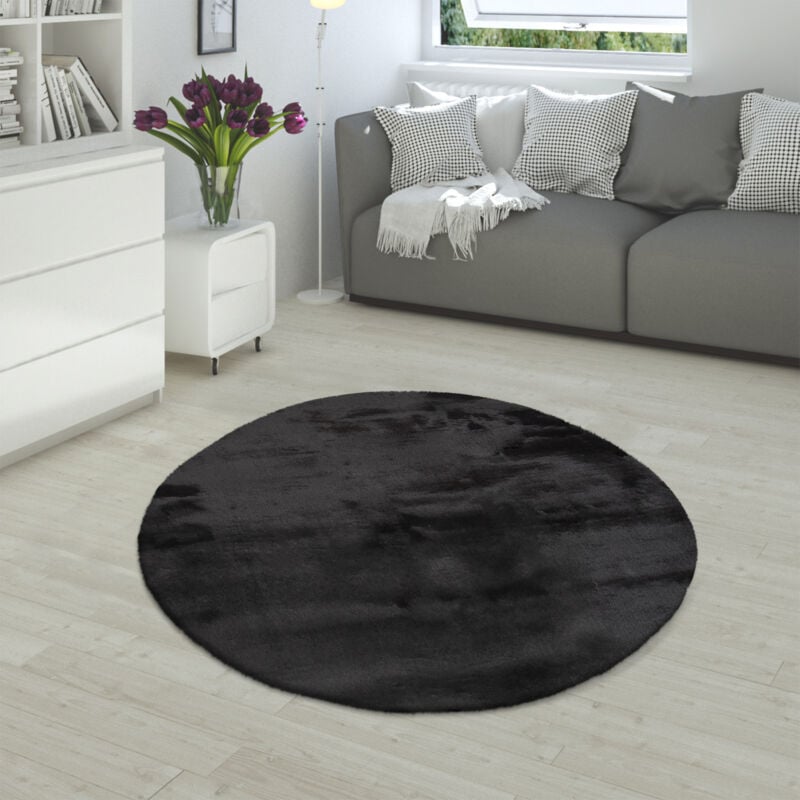 foto del prodotto tappeto a pelo lungo per soggiorno in ecopelliccia ultrasoffice, imitazione pelliccia di coniglio in nero ovale 150x170 cm paco home