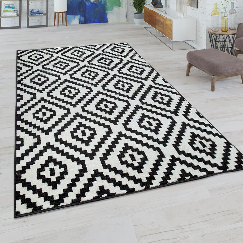 foto del prodotto tappeto da soggiorno con motivo a rombi in colori pastello, look moderno etnico boho 70x140 cm, nero bianco paco home