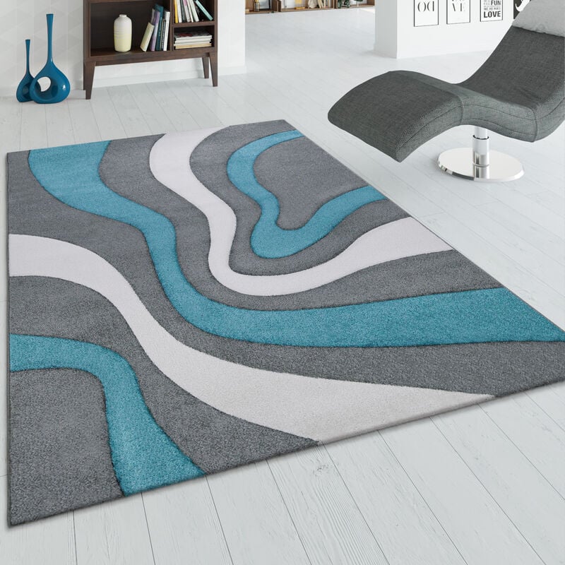 foto del prodotto tappeto di design moderno, astratto, con look a onde, taglio sagomato, in diversi colori e misure 60x110 cm, turchese paco home