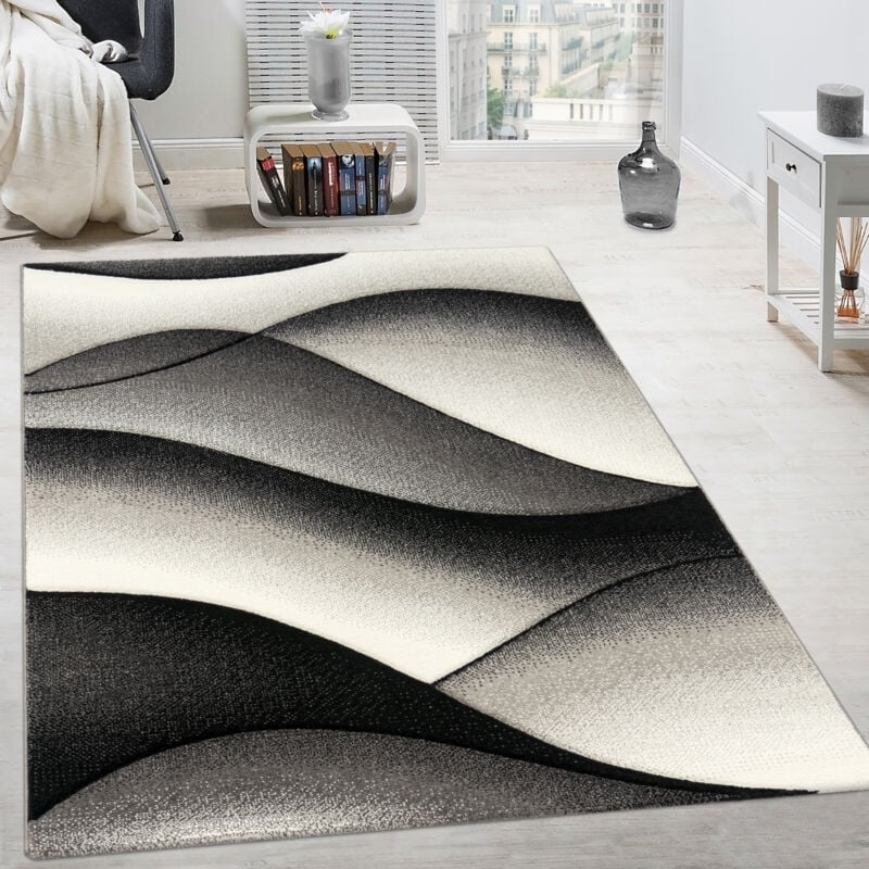 foto del prodotto tappeto di design moderno astratto effetto a onde taglio sagomato in grigio antracite 60x110 cm paco home