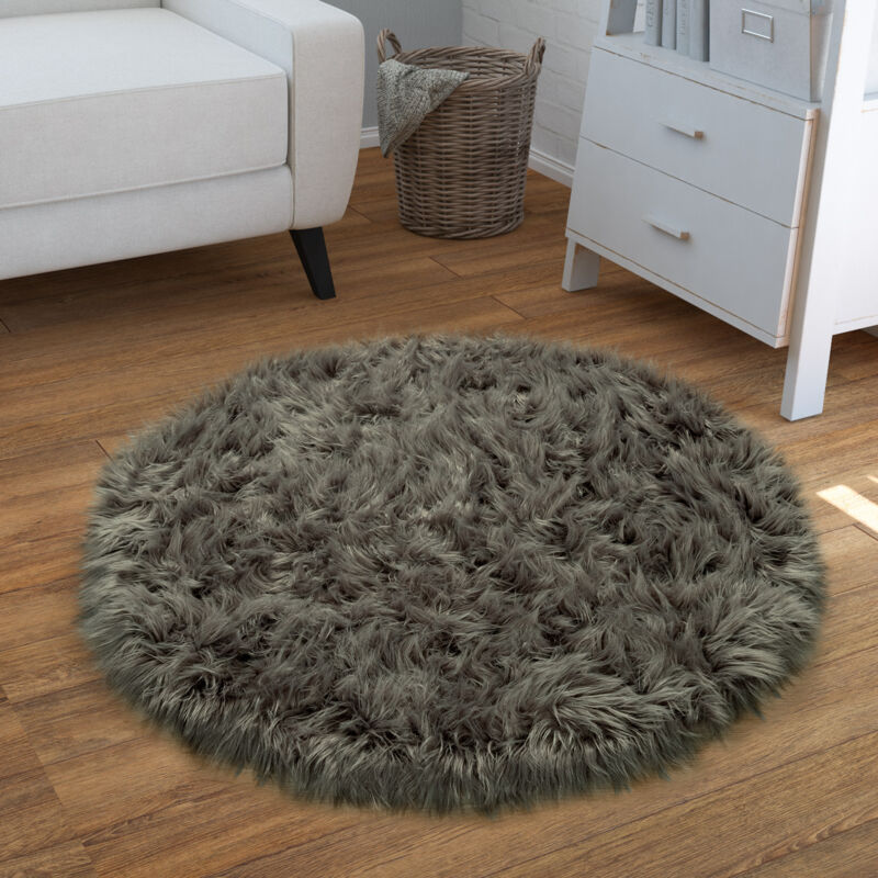 foto del prodotto tappeto in ecopelliccia, cuscini, a cuore, rotondo, varie forme, grigio scuro 120 cm tondo paco home