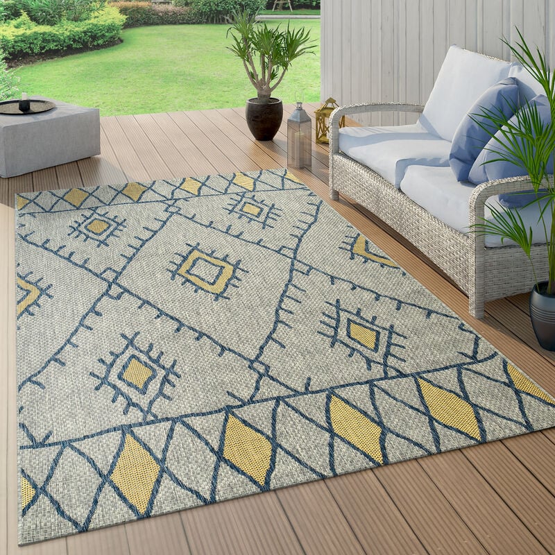 foto del prodotto tappeto per interni ed esterni con rombi geometrici astratti e design etnico, in blu 80x150 cm paco home