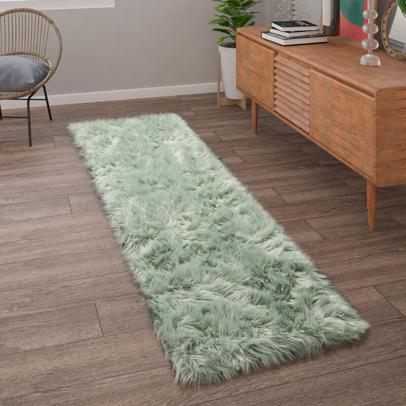 foto del prodotto tappeto salotto pelliccia finta imitazione pelo lungo cuscino cuore rotondo 50x150 cm, verde menta paco home