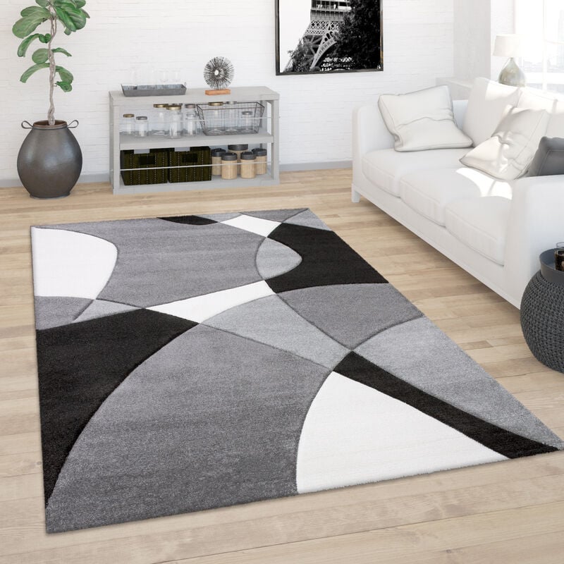 foto del prodotto tappeto salotto pelo corto moderno look 3d contorni rifilati motivo astratto 200x290 cm, nero bianco paco home