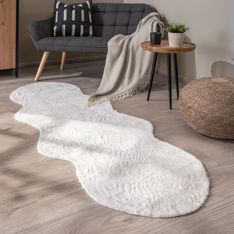 foto del prodotto tappeto salotto pelo corto monocolore in forma finta pelliccia moderna morbida crema, 70x200 cm forma di pelliccia paco home