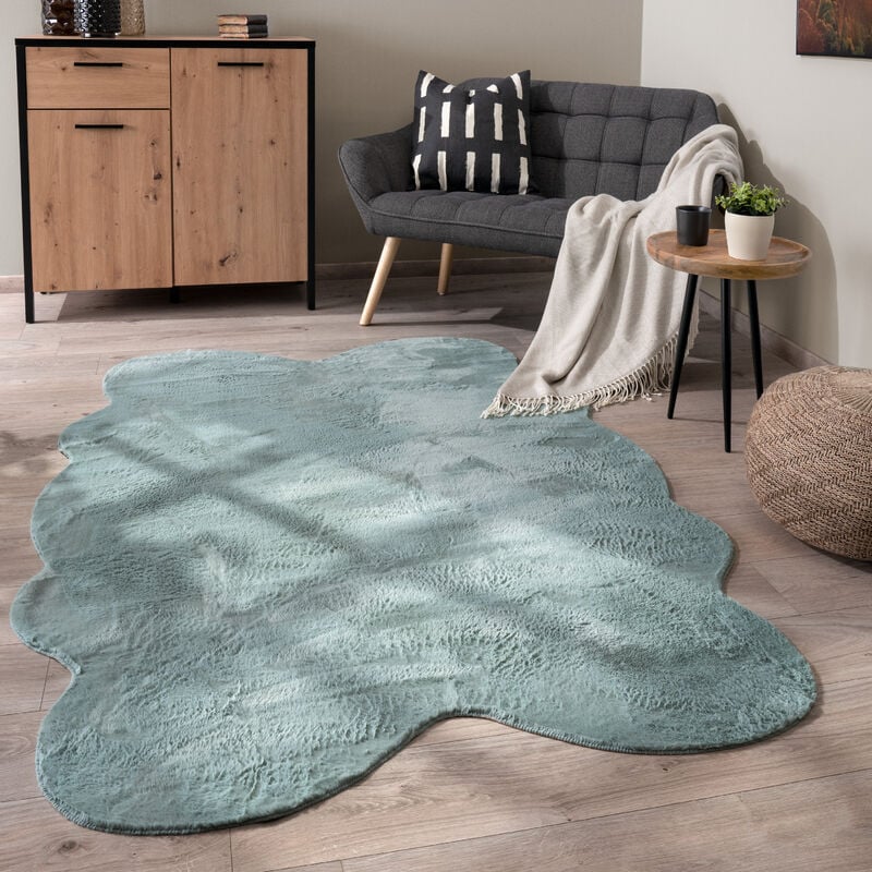 foto del prodotto tappeto salotto pelo corto monocolore in forma finta pelliccia moderna morbida turchese, 140x200 cm forma di pelliccia paco home