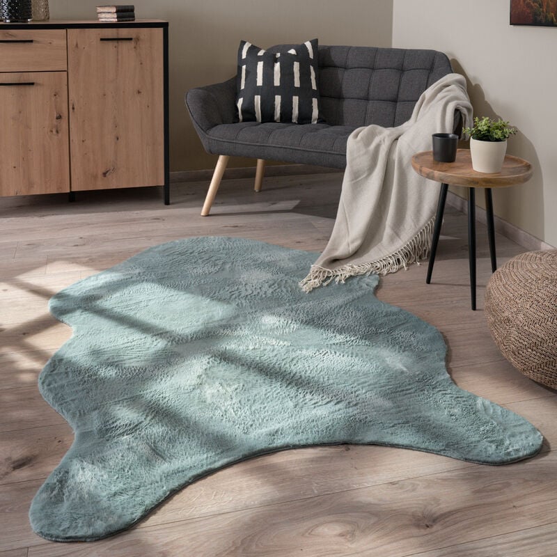 foto del prodotto tappeto salotto pelo corto monocolore in forma finta pelliccia moderna morbida turchese, 80x120 cm forma di pelliccia paco home