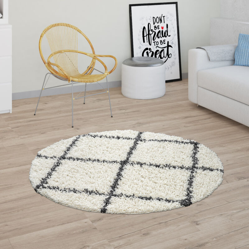 foto del prodotto tappeto shaggy a pelo lungo per soggiorno, con design scandinavo e motivo di rombi in beige 120 cm tondo paco home