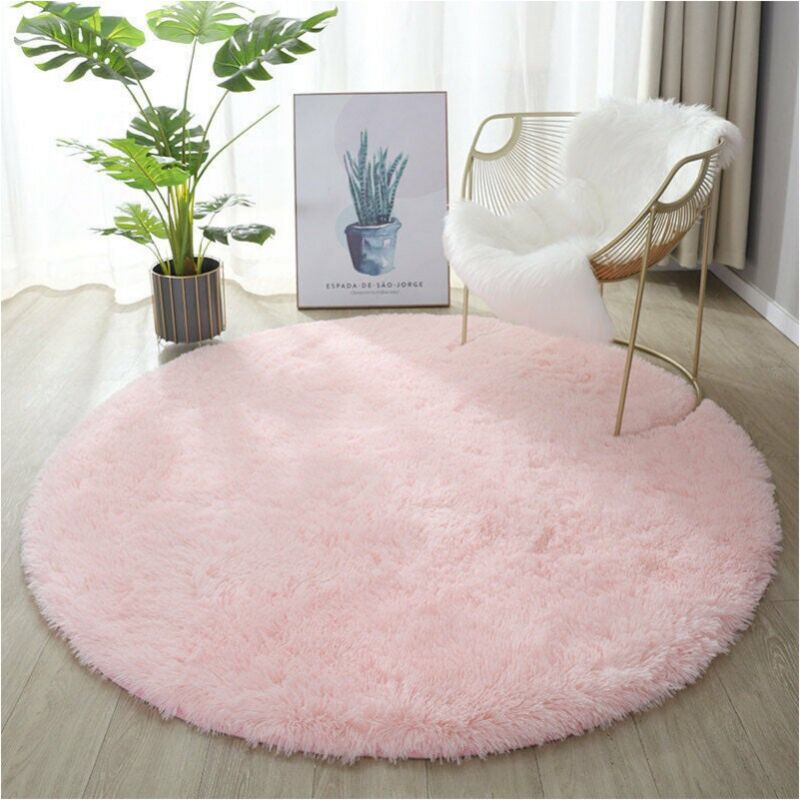 foto del prodotto tappeto soggiorno rosa rotondo moderno in pelliccia a pelo lungo soffice 100 cm