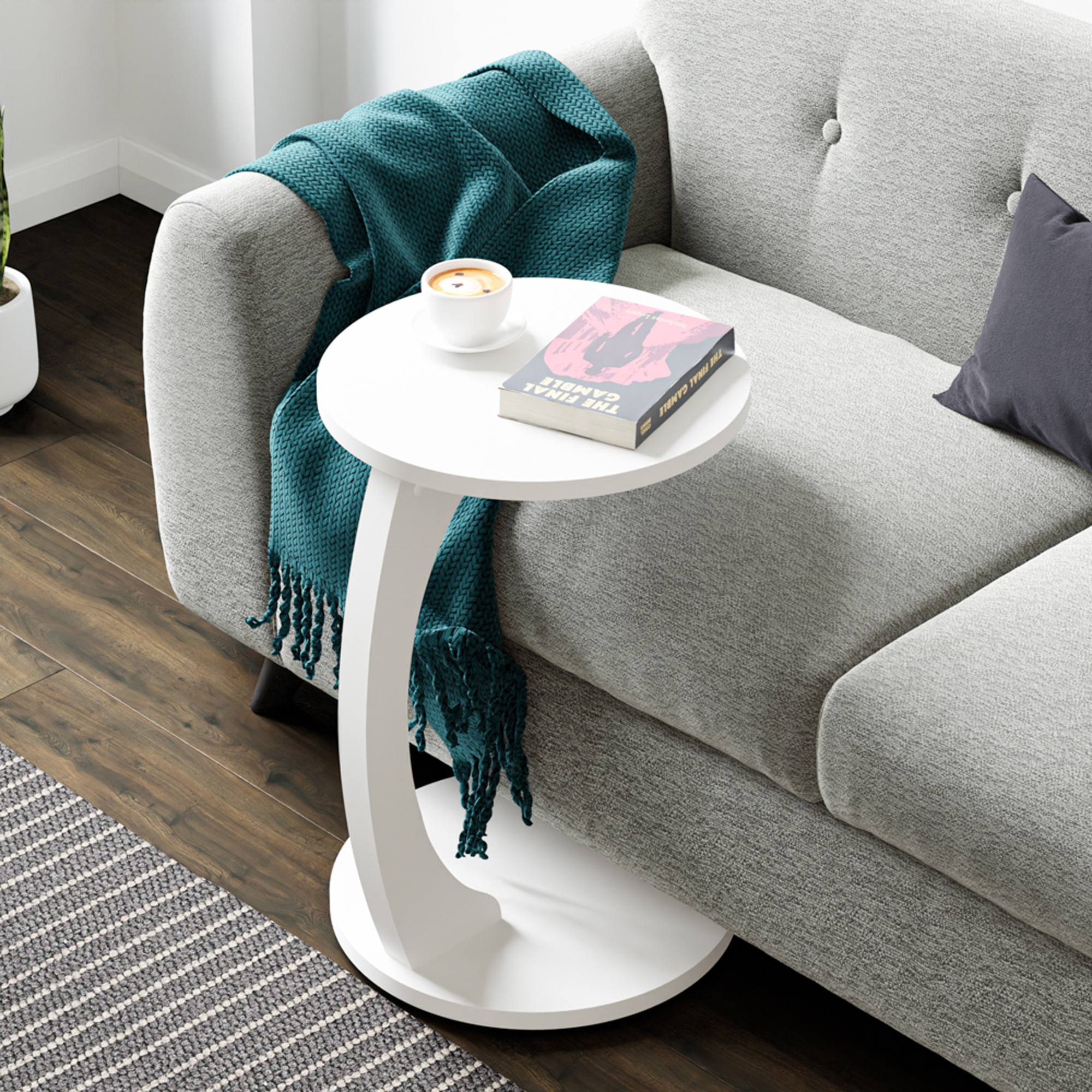 foto del prodotto tavolino da divano holeby con rotelle e piano rotondo bianco en.casa 
