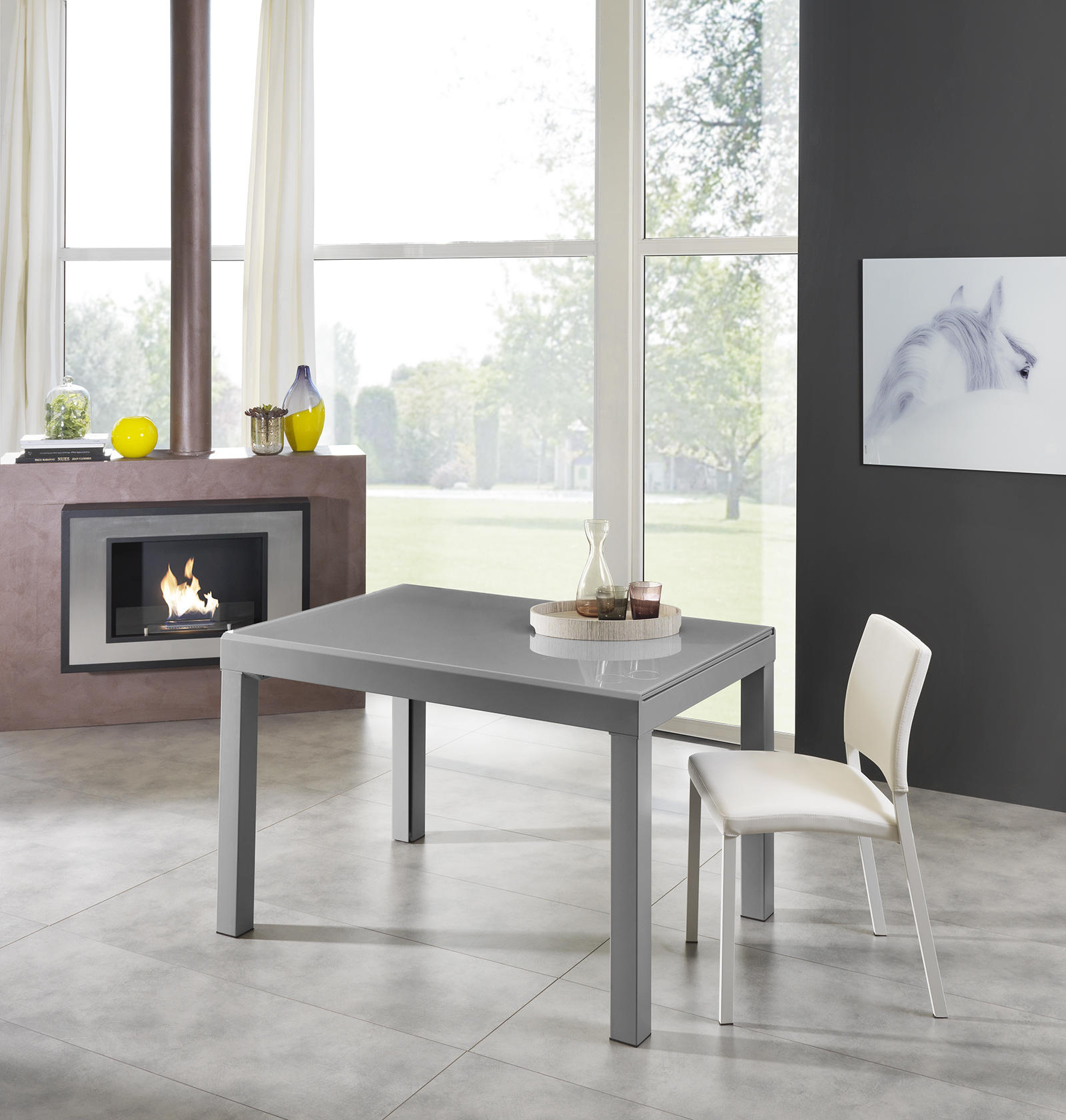 foto del prodotto tavolo allungabile con top in vetro temperato grigio 120 175 230 290 350x75h cm