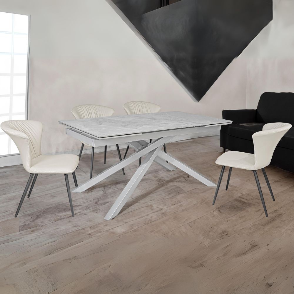 foto del prodotto tavolo allungabile nefti con top in ceramica colore grigio chiaro italiano lucido con gambe argento